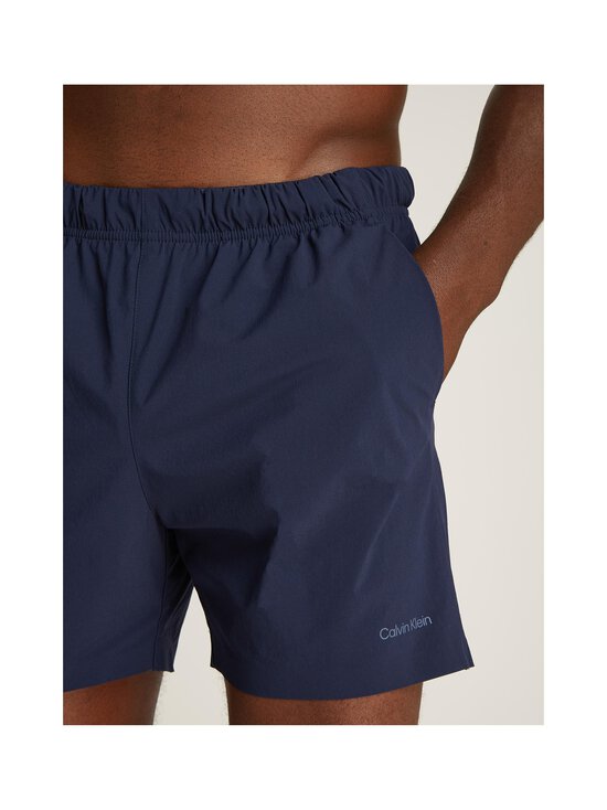 Calvin Klein Underwear - Ujumispüksid Medium Drawstring - CEF DARK SAPPHIRE - photo 5 Calvin Klein Underwear - Ujumispüksid Medium Drawstring - CEF DARK SAPPHIRE | Stockmann - photo 5