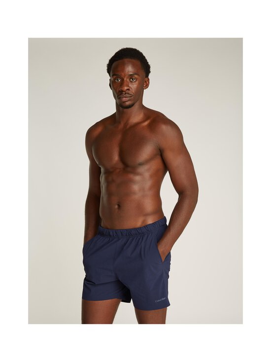 Calvin Klein Underwear - Ujumispüksid Medium Drawstring - CEF DARK SAPPHIRE - photo 4 Calvin Klein Underwear - Ujumispüksid Medium Drawstring - CEF DARK SAPPHIRE | Stockmann - photo 4