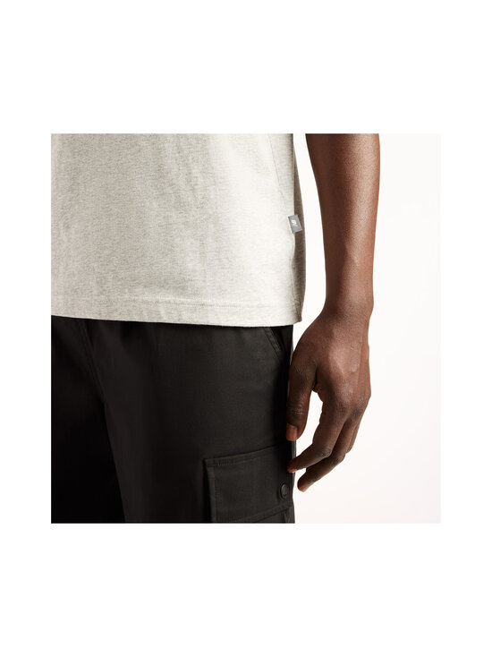 New Balance - Woven Label t-paita - AGM ATHLETIC GREY/MULTI | Stockmann - photo 5