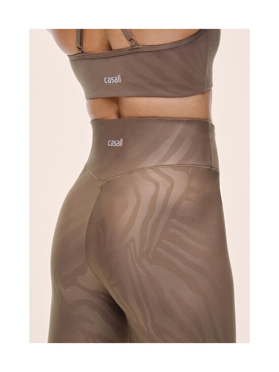 Casall - Heat Printed High Waist treniņu legingi - 666 ZEBRA KHAKI - photo 5 Casall - Heat Printed High Waist treniņu legingi - 666 ZEBRA KHAKI | Stockmann - photo 5
