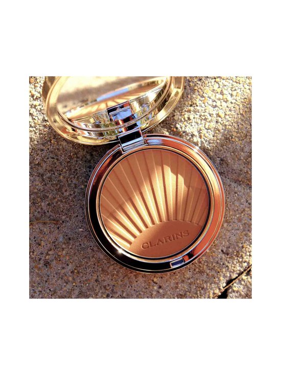 Clarins - Summer Look Bronzing Compact Powder -aurinkopuuteri - BRONZE - photo 6 Clarins - Summer Look Bronzing Compact Powder -aurinkopuuteri - BRONZE | Stockmann - photo 6